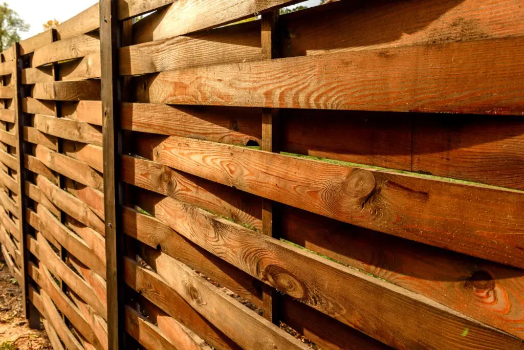 Read more about the article Staining a Cedar Fence: The Complete 2026 Homeowner’s Guide