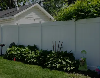 privacy fence in backyard that is vinyl material