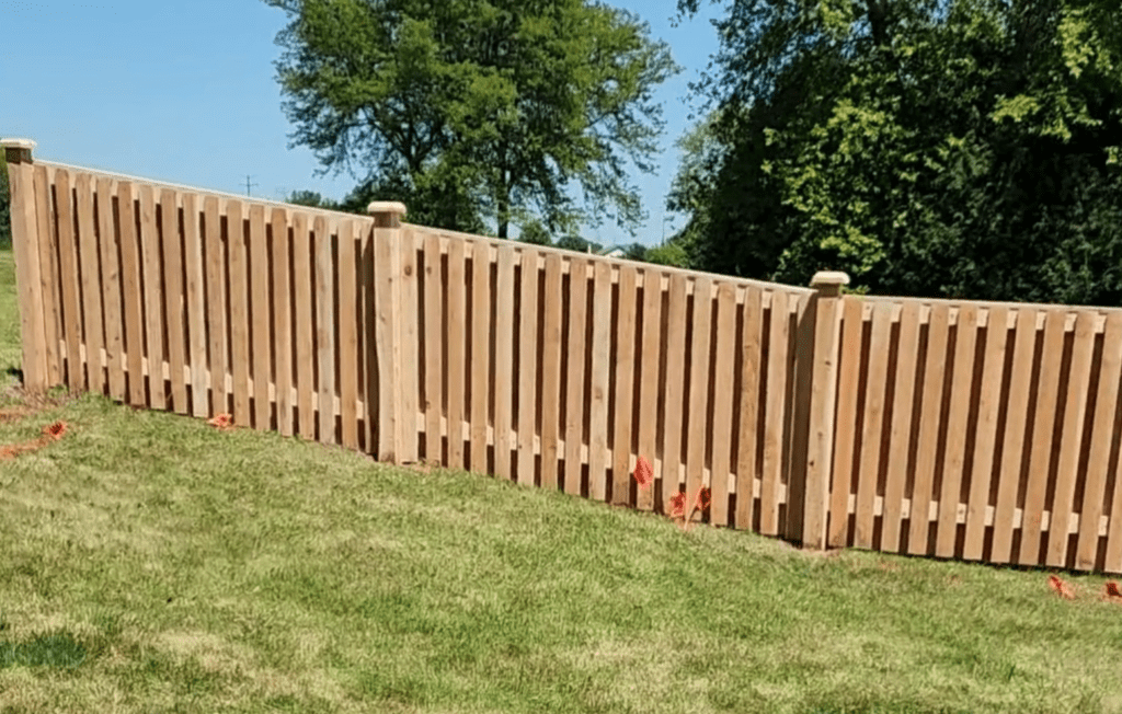 shadowbox cedar fence on hill