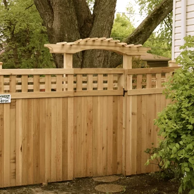 wood fence with arched gate
