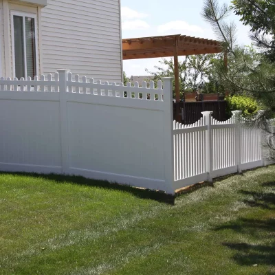 vinyl privacy fence connected to a regular vinyl fence
